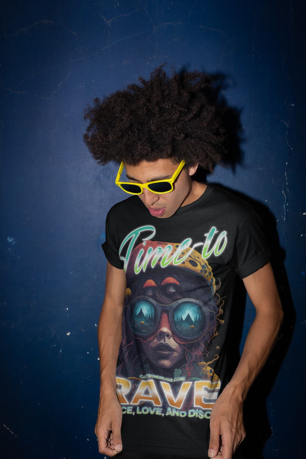 Rave Tee flatlay with neon accessories
