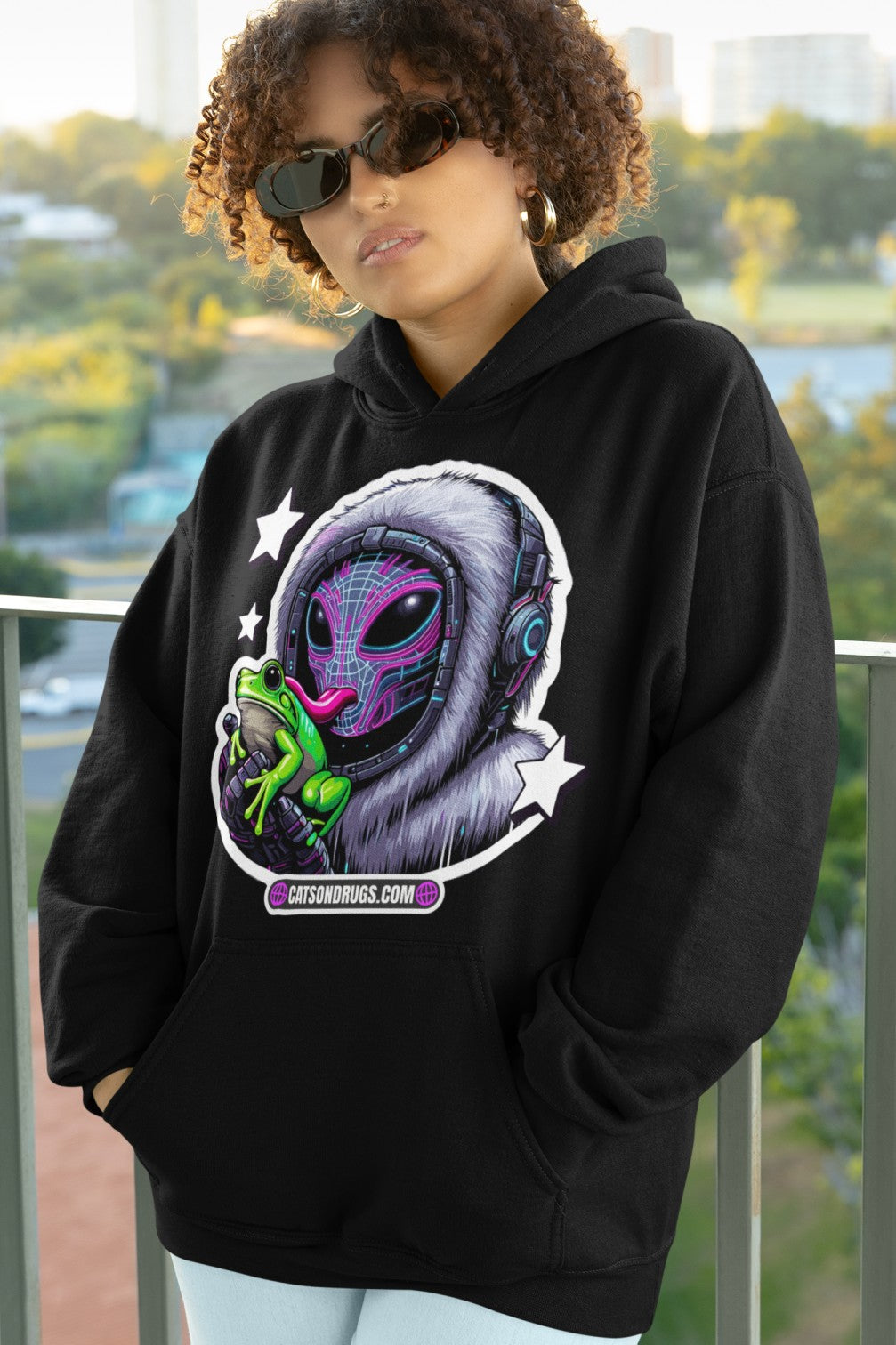 Trippy Clothing oversized hoodie styled with streetwear outfit at night