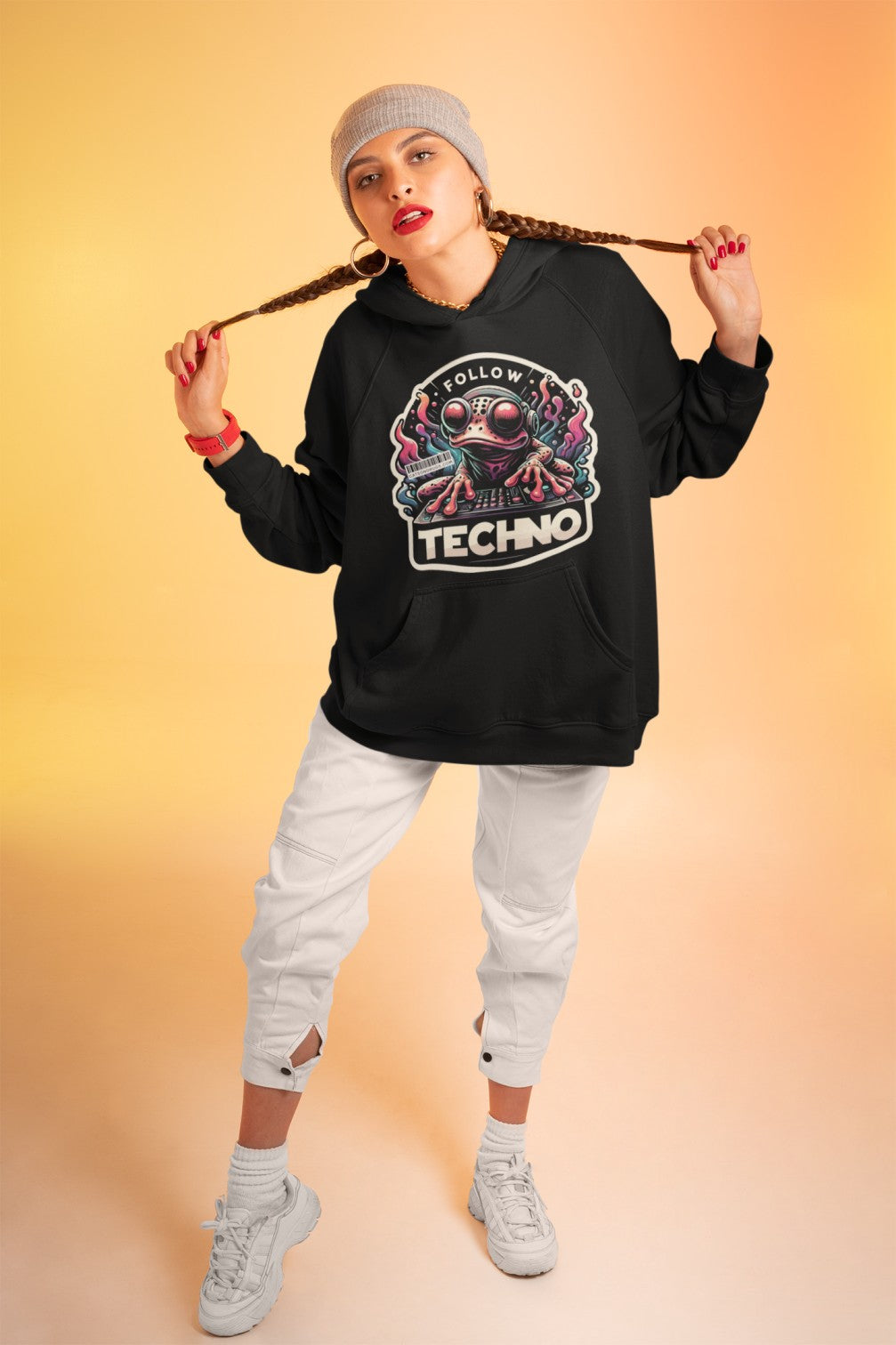 Model wearing Trance Clothing hoodie with techno frog artwork at music festival  